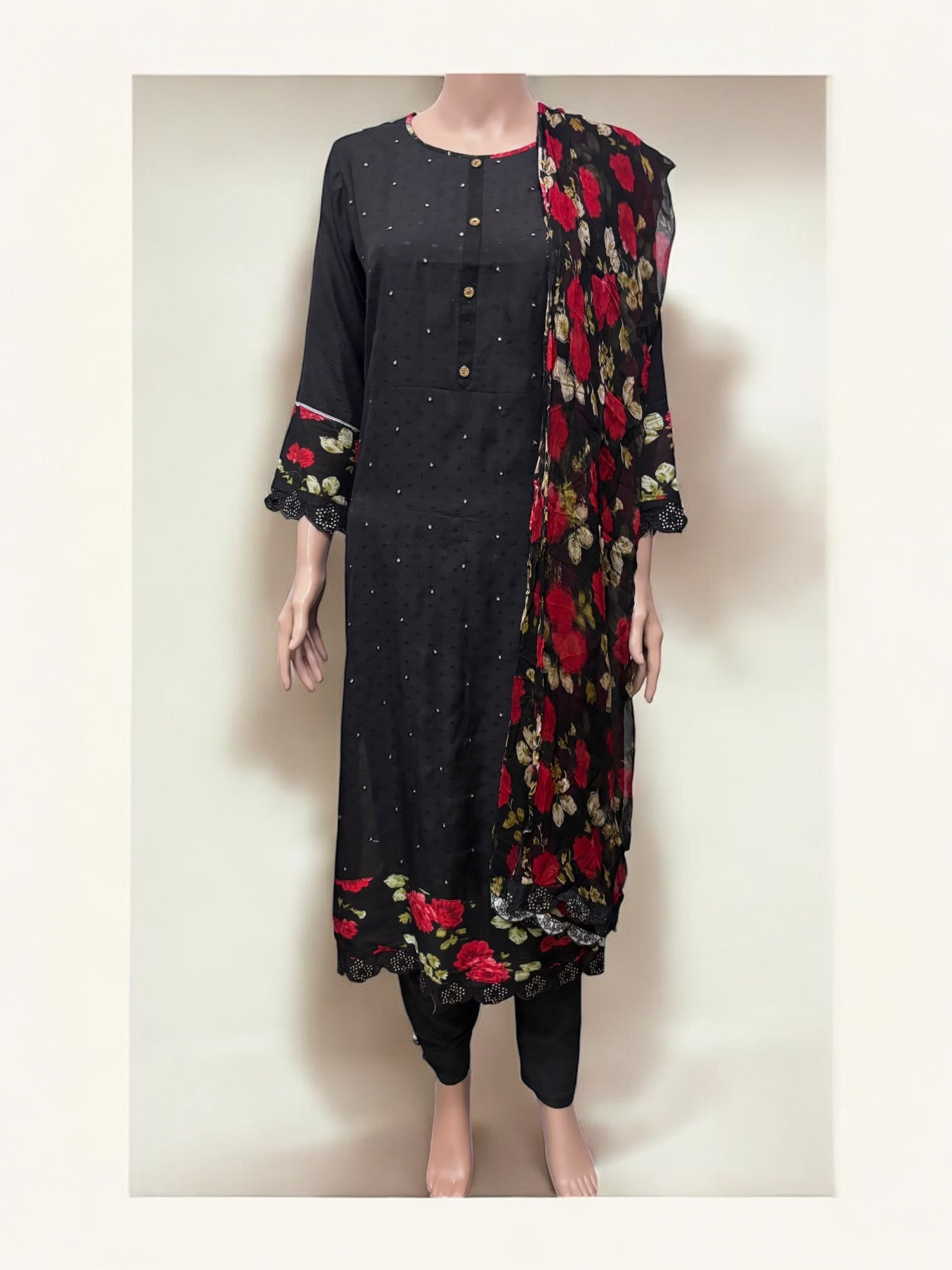 Traditional Saree Ghor Charlotte Salwar Kameez set for women with intricate ethnic embroidery and vibrant fabric.