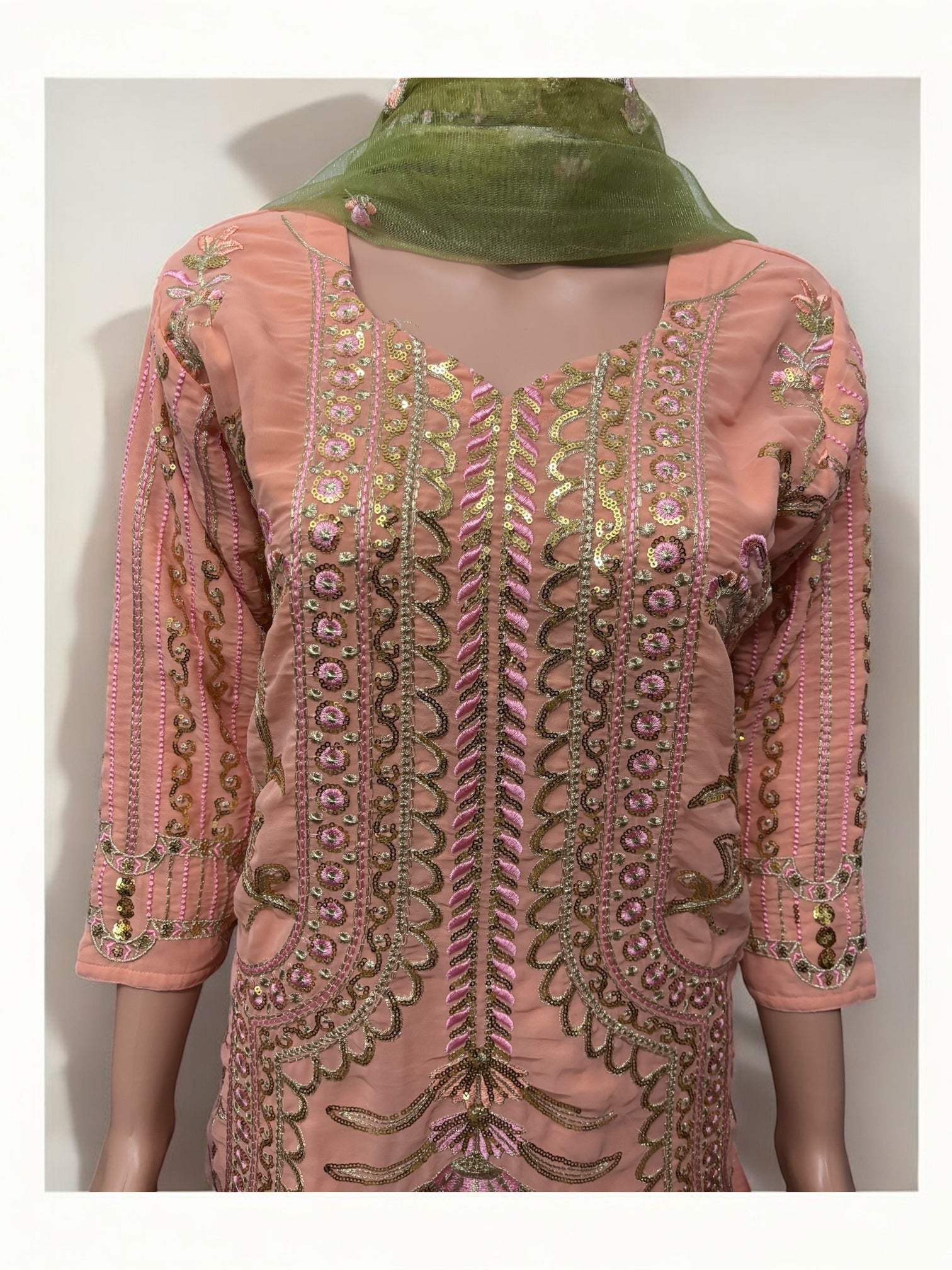 Traditional Saree Ghor Charlotte Salwar Kameez set for women, featuring ethnic wear with intricate embroidery and vibrant fabric.