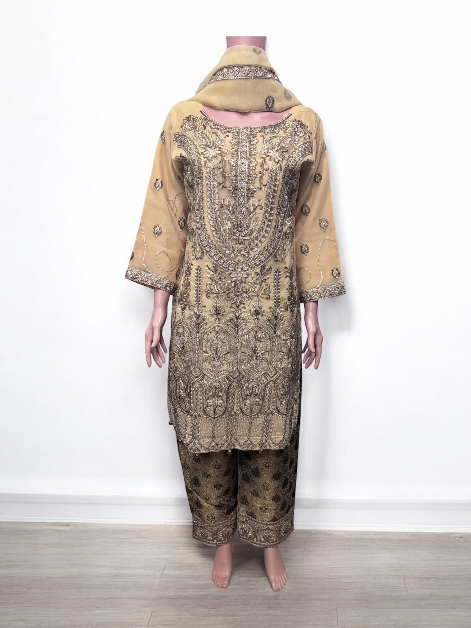 Traditional Saree Ghor Charlotte Salwar Kameez set for women with intricate ethnic embroidery and vibrant colors.