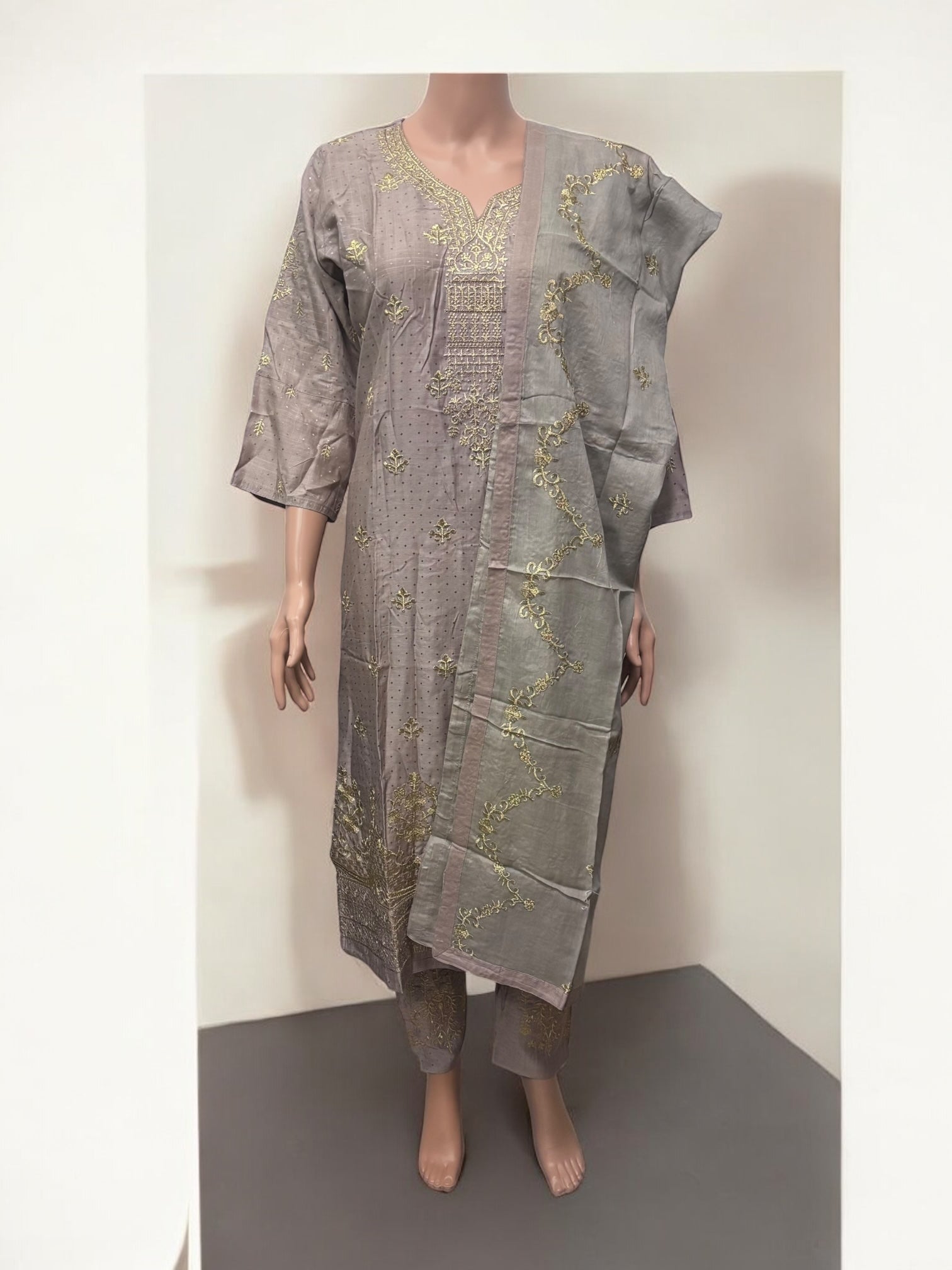 Traditional Saree Ghor Charlotte Salwar Kameez set for women, featuring elegant ethnic wear with detailed fabric and vibrant colors.
