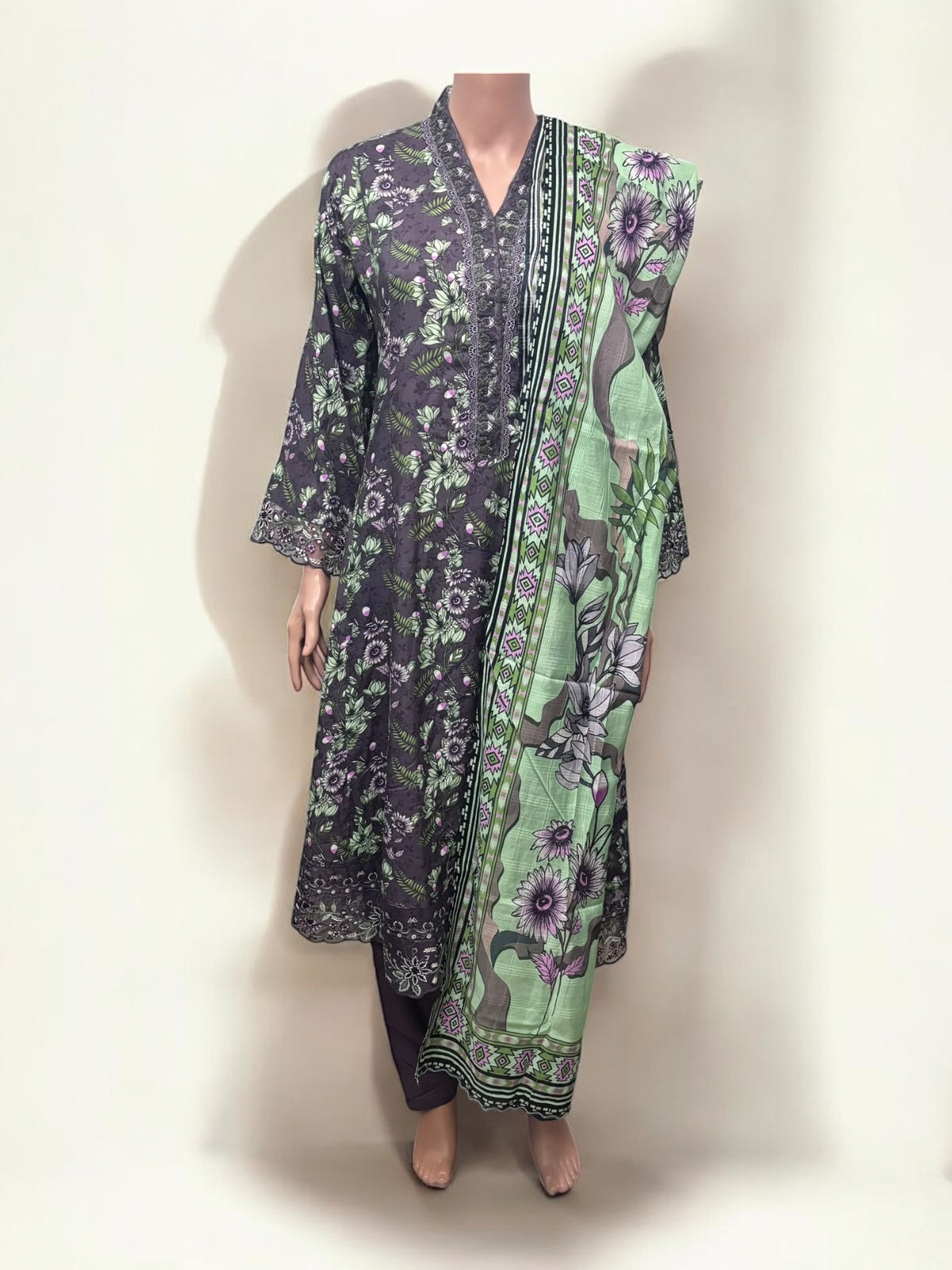 Traditional Saree Ghor Charlotte Salwar Kameez set for women, showcasing intricate ethnic wear with vibrant fabric and elegant design.