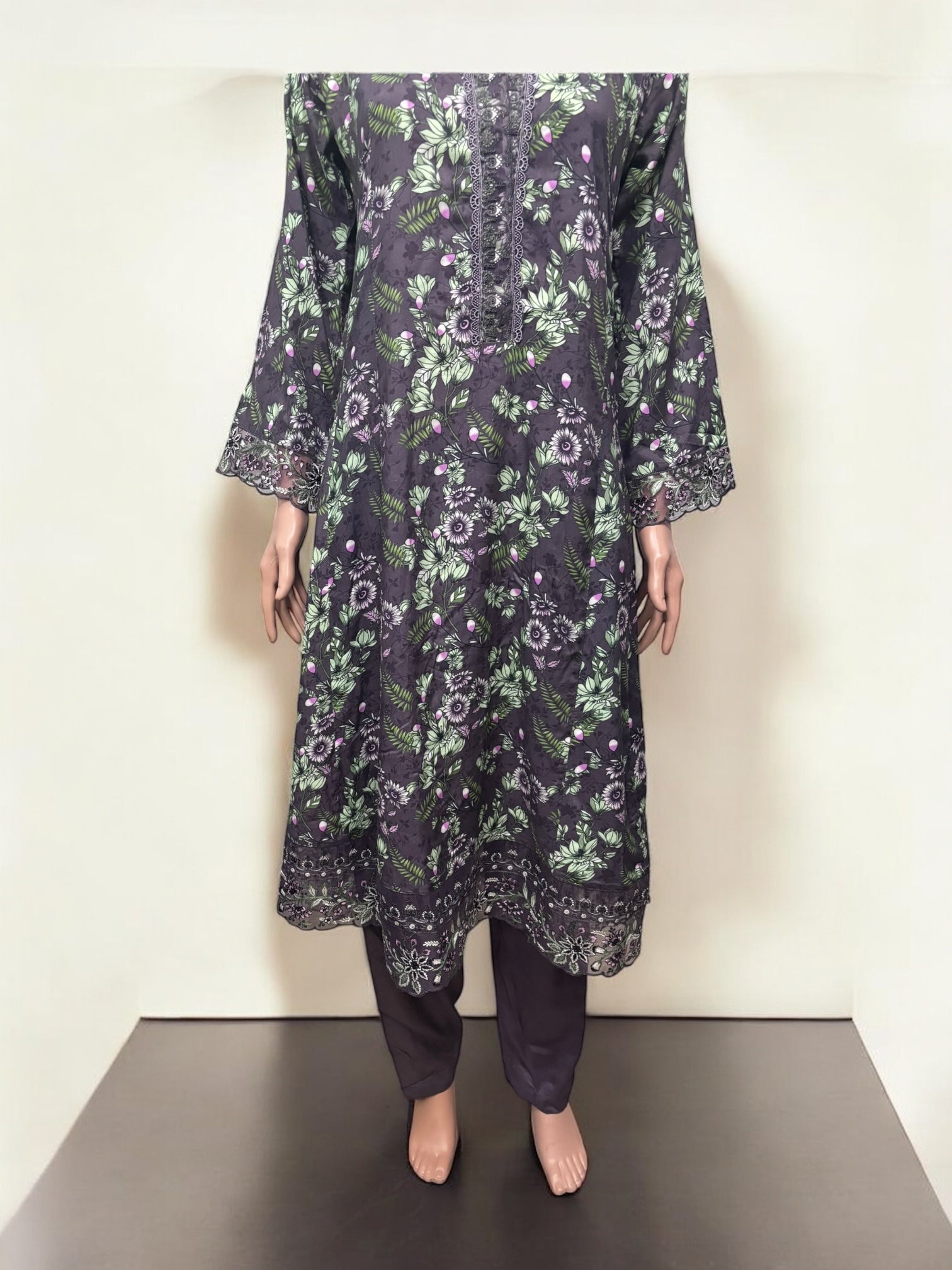 Traditional Saree Ghor Charlotte Salwar Kameez set for women, featuring elegant ethnic wear with intricate patterns and vibrant colors.