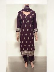 Traditional Salwar Kameez set by Saree Ghor Charlotte, ethnic wear for women featuring vibrant fabric and intricate embroidery.
