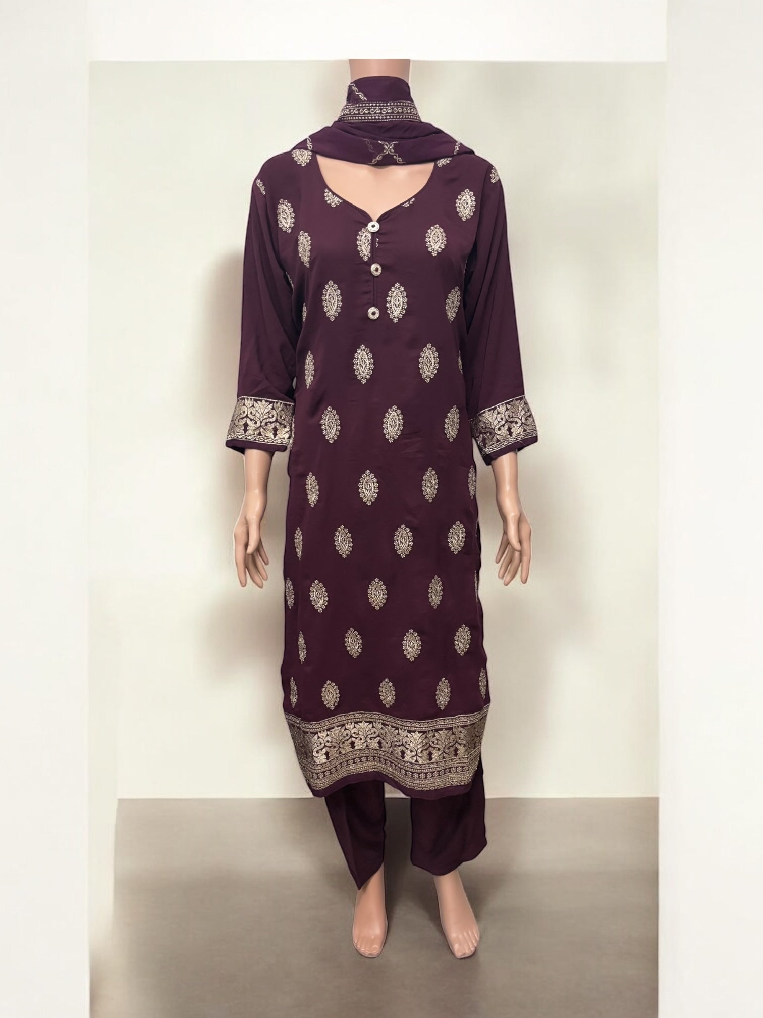 Traditional Salwar Kameez set by Saree Ghor Charlotte, ethnic wear for women featuring vibrant fabric and intricate embroidery.