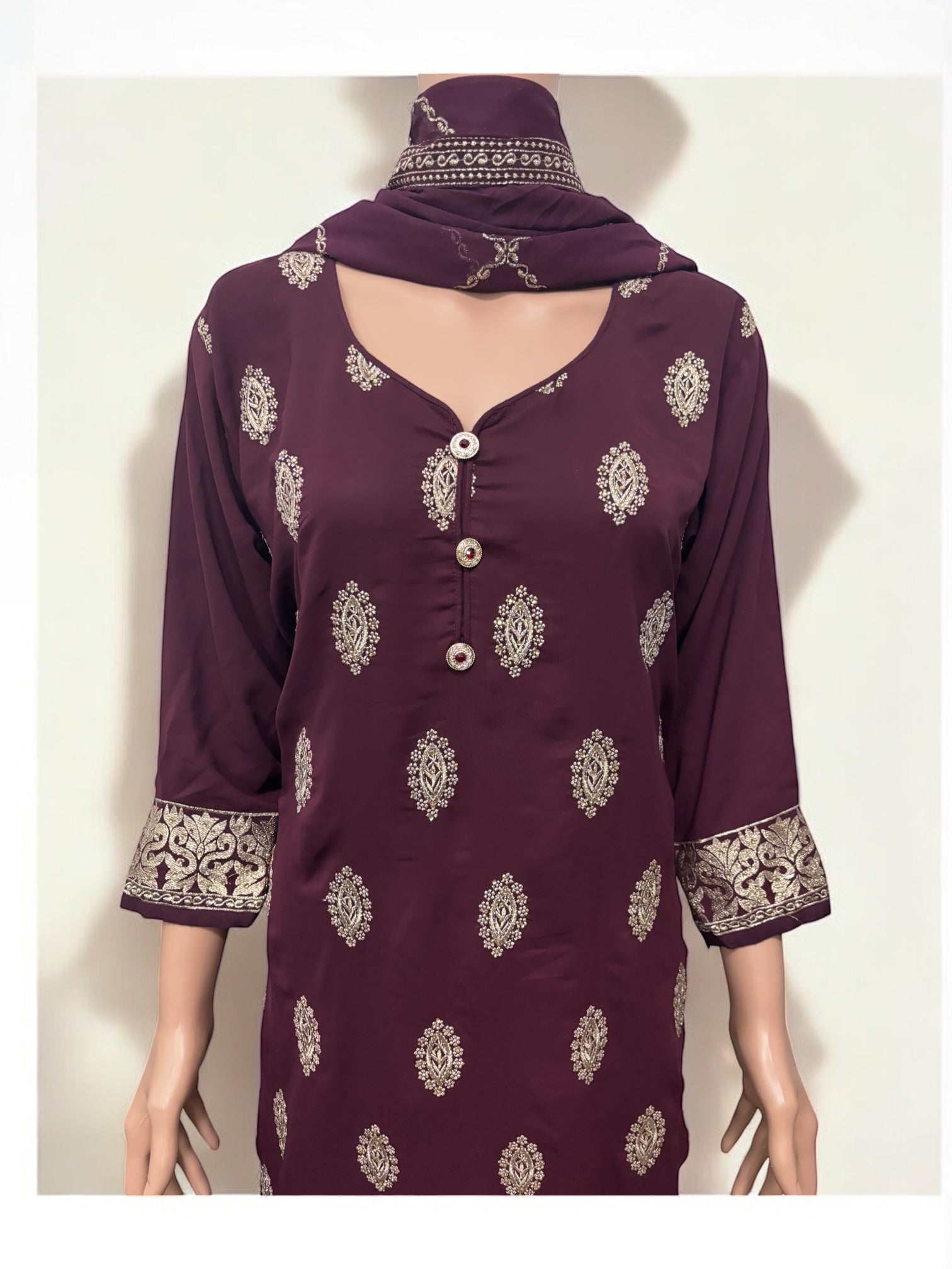 Traditional Saree Ghor Charlotte Salwar Kameez set for women, featuring colorful ethnic wear with intricate patterns and fabric details.