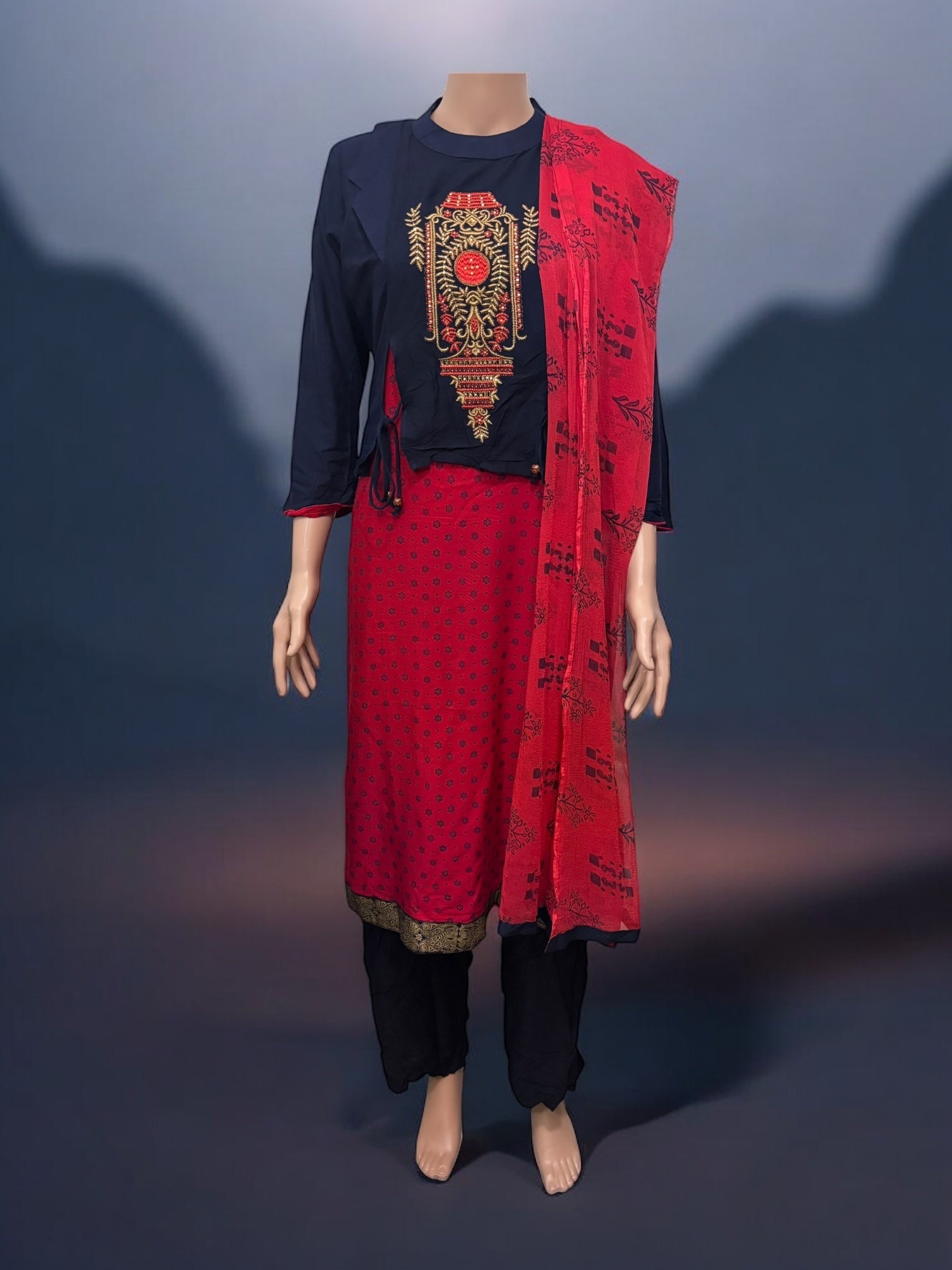 Traditional Saree Ghor Charlotte Salwar Kameez set for women, featuring ethnic wear with detailed embroidery and vibrant fabric.