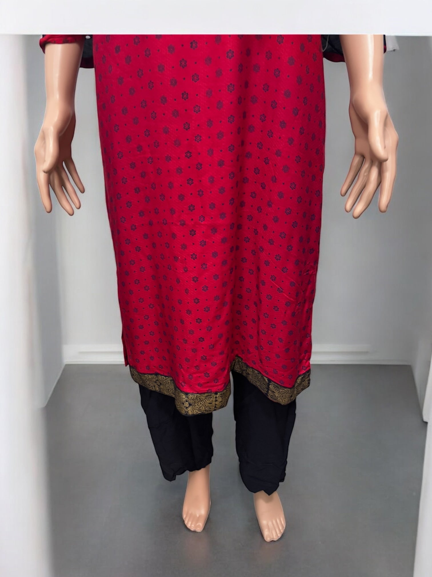 Traditional Saree Ghor Charlotte Salwar Kameez set for women, featuring ethnic wear with vibrant fabric and intricate design details.