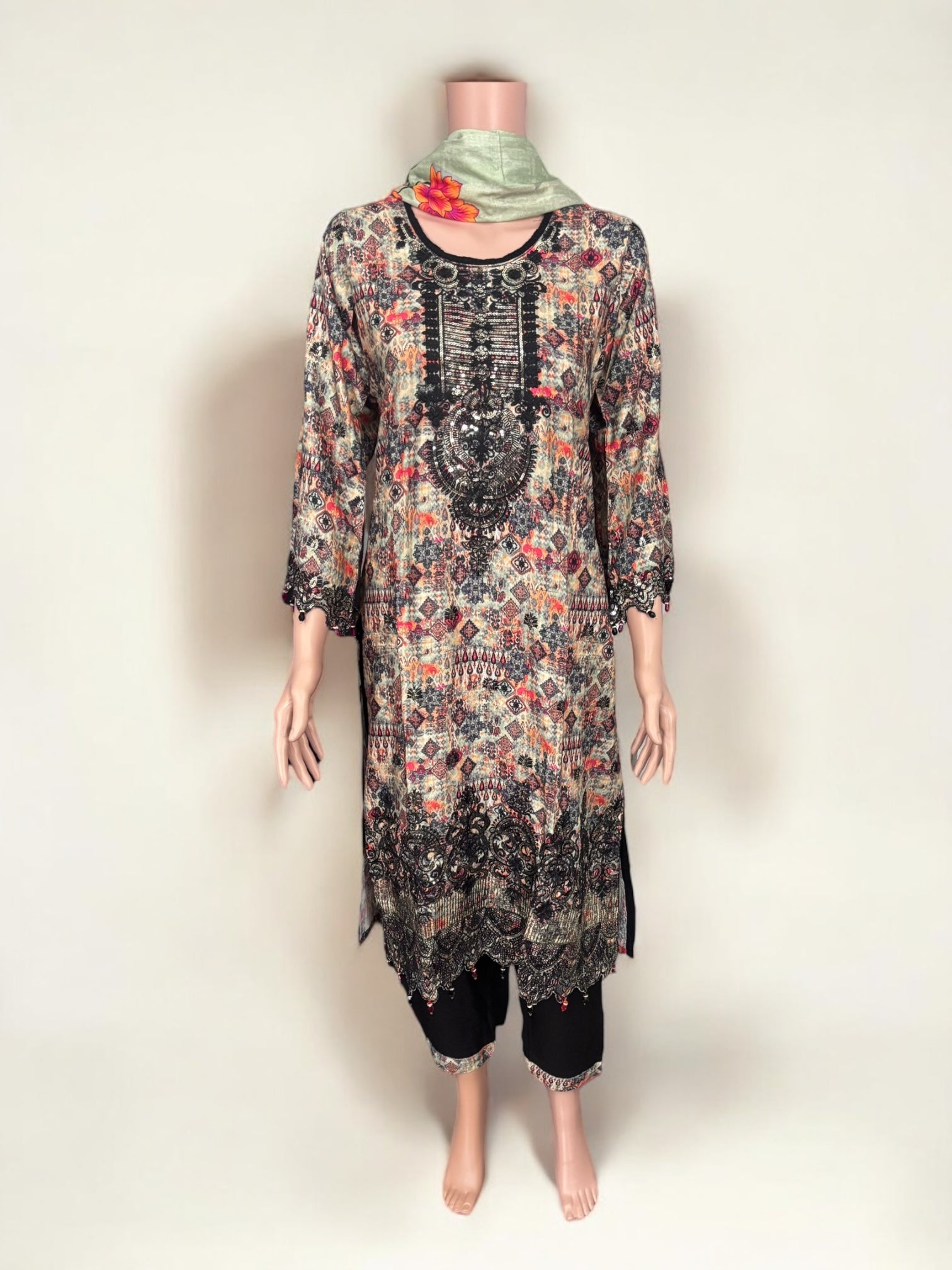 Traditional soft cotton Salwar Kameez suit by Saree Ghor Charlotte, featuring intricate ethnic design and vibrant colors for women.