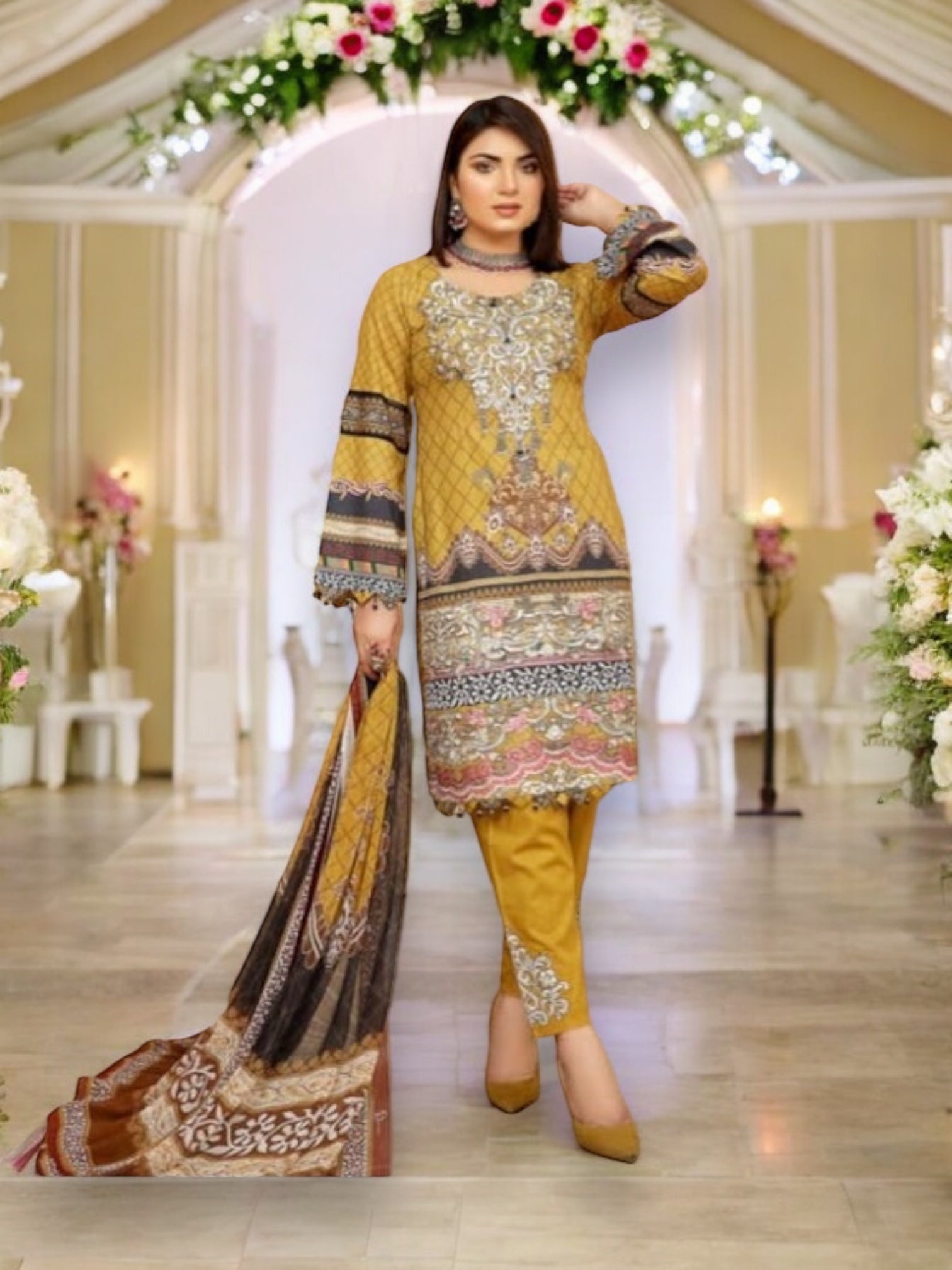 Traditional Soni Brand Pakistani Salwar Kameez for women, featuring vibrant ethnic wear with intricate patterns and colorful fabric.