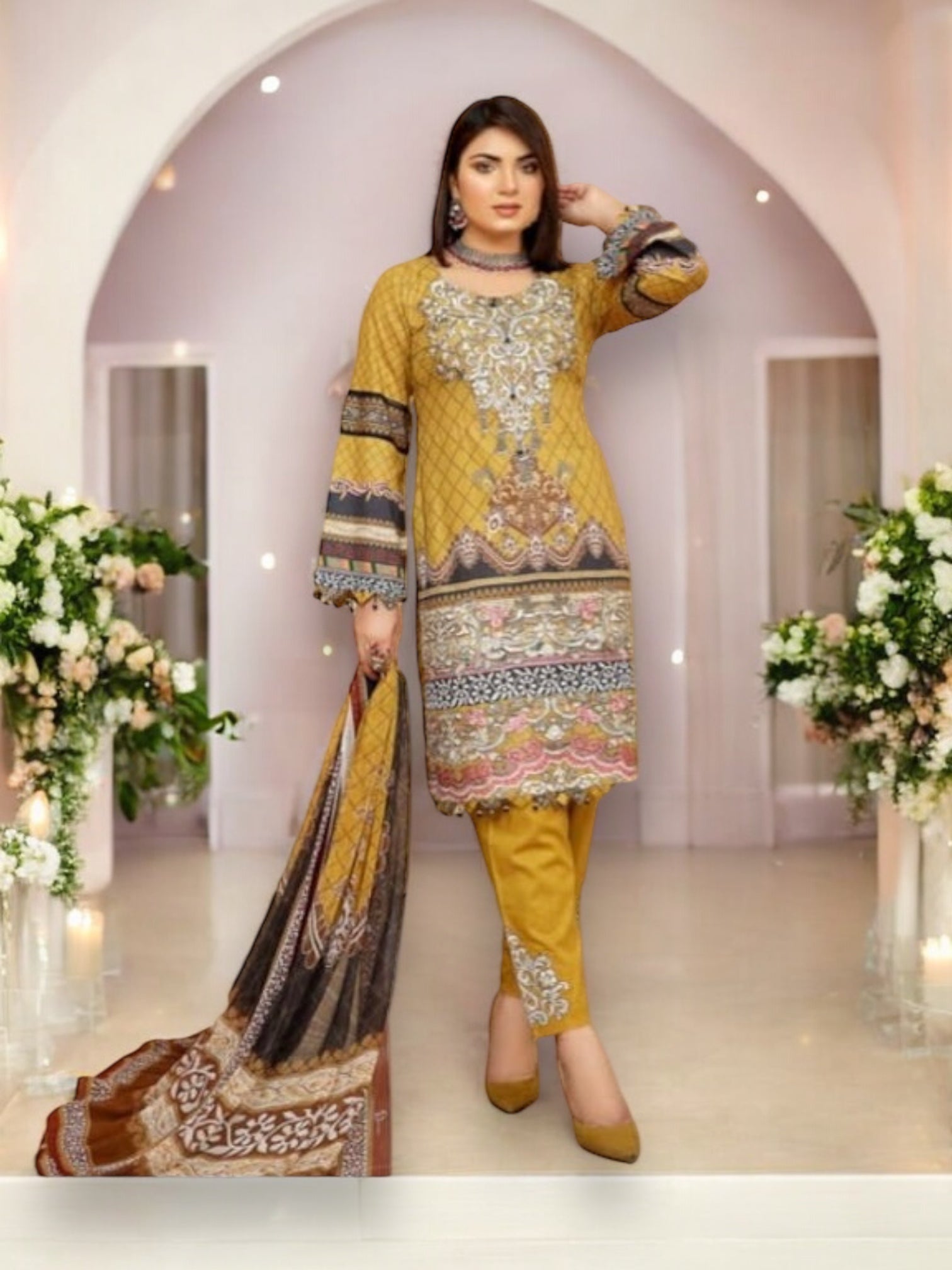 Traditional Soni Brand Pakistani Salwar Kameez for women with intricate embroidery and vibrant colors, cultural ethnic wear.