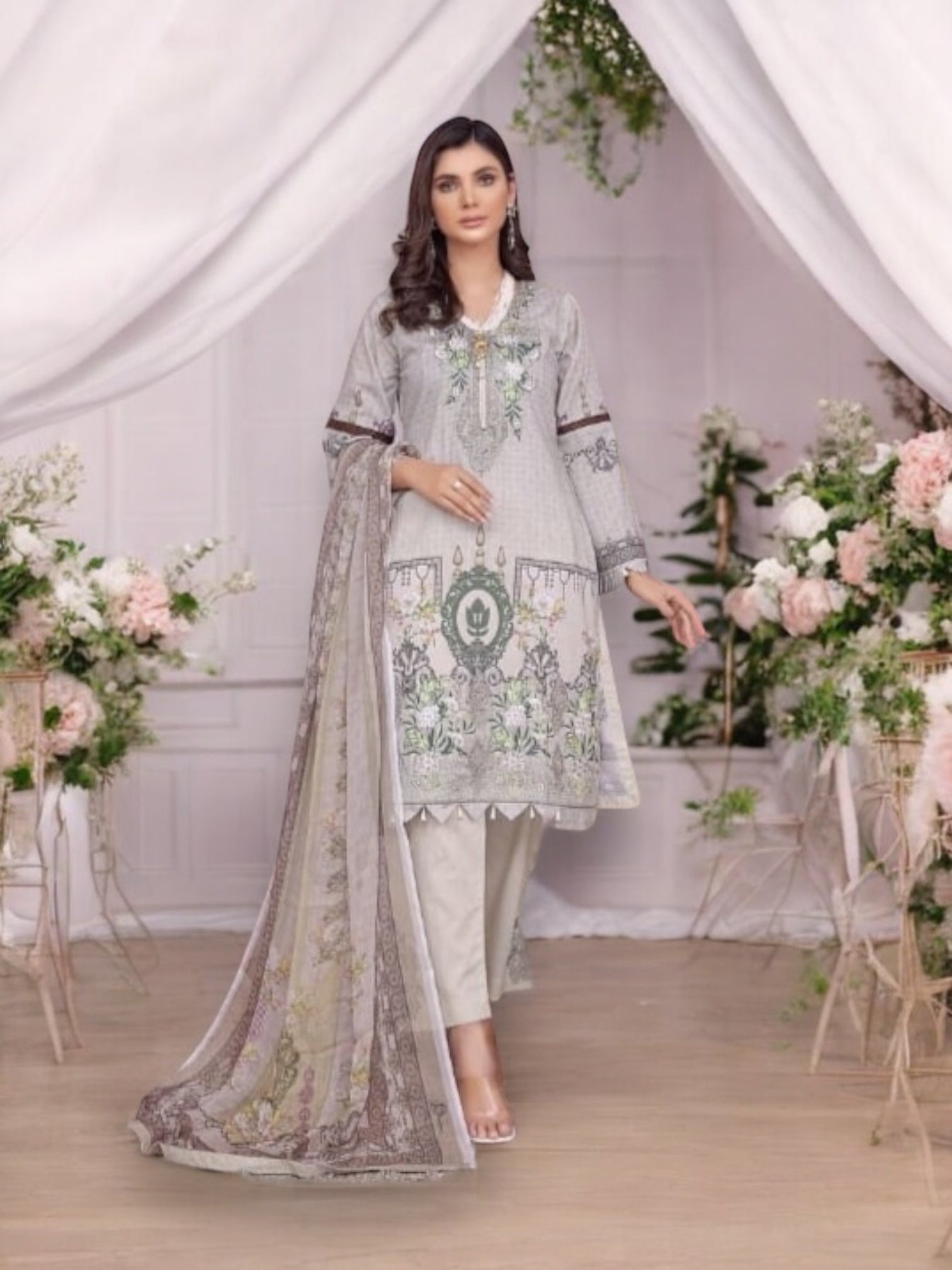 Traditional Soni Brand Pakistani Salwar Kameez for women, featuring vibrant ethnic wear with detailed embroidery.