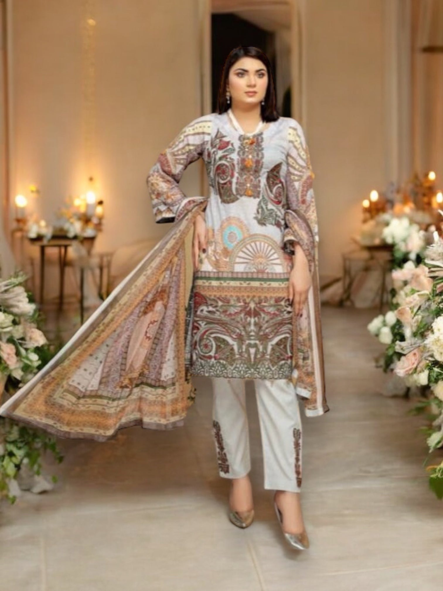 Traditional Soni Brand Pakistani Salwar Kameez for women, vibrant ethnic wear with intricate patterns and colorful fabric.