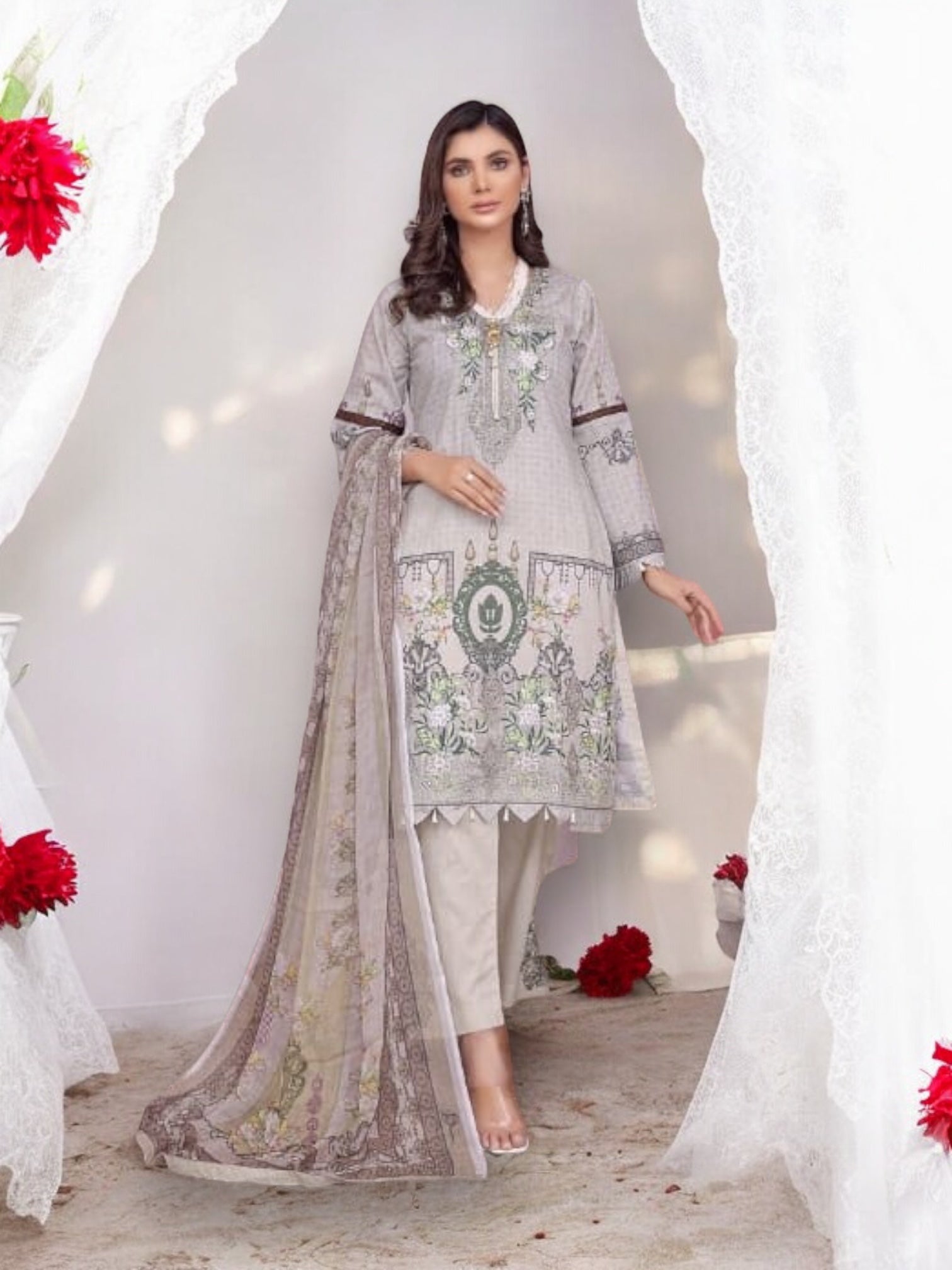 Traditional Soni Brand Pakistani Salwar Kameez for women, ethnic cultural dress with intricate embroidery and vibrant colors.