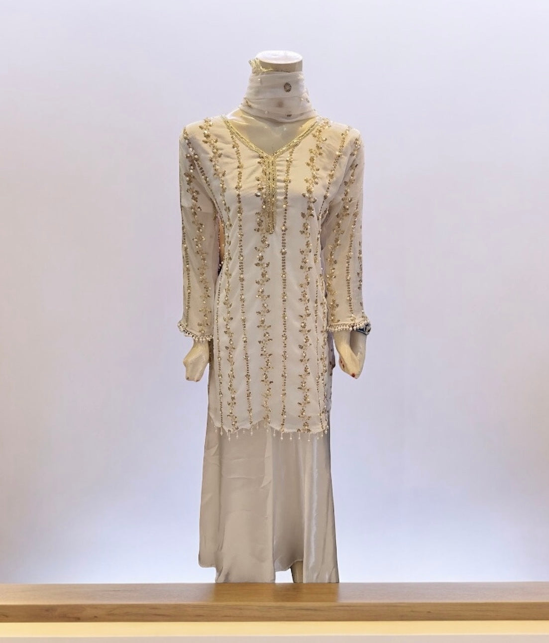 White Great Value Traditional Salwar Kameez Suit by Saree Ghor Charlotte, ethnic wear for women with intricate design details.