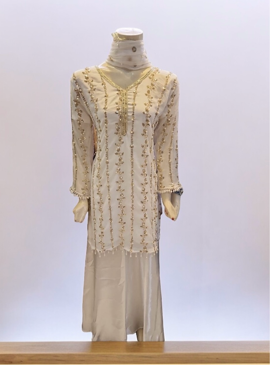 White Great Value Traditional Salwar Kameez Suit by Saree Ghor Charlotte, ethnic wear for women, featuring intricate embroidery and fabric details.