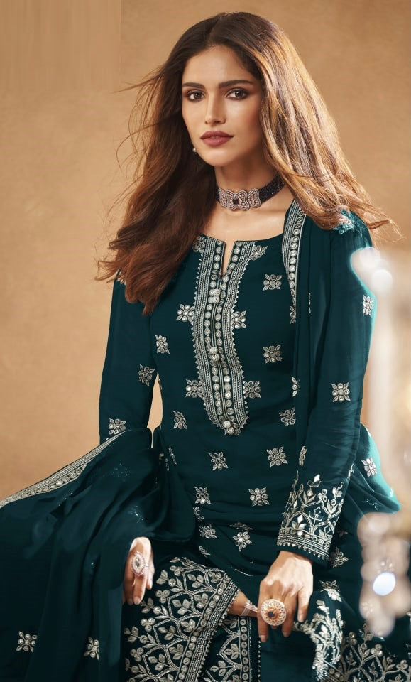 Dazzling faux Georgette Salwar Kameez with intricate embroidery from Saree Ghor Charlotte, showcasing detailed work and elegant design.