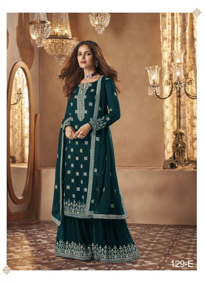 Dazzling faux Georgette salwar suit with intricate embroidery by Saree Ghor Charlotte, featuring a traditional salwar kameez design.