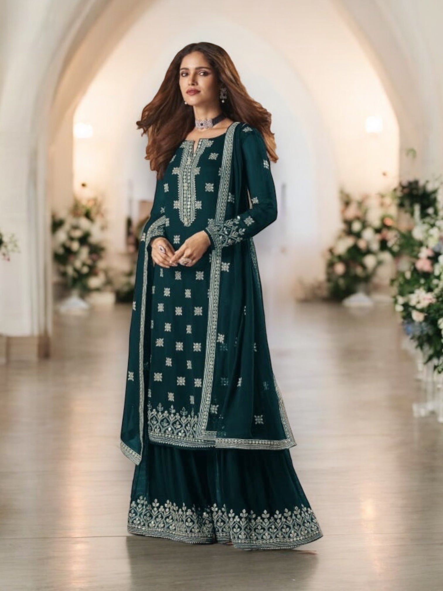 Dazzling faux georgette salwar suit with intricate embroidery from Saree Ghor Charlotte, featuring traditional Indian design.
