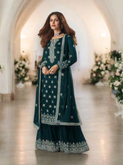 Dazzling faux georgette salwar suit with intricate embroidery from Saree Ghor Charlotte, featuring traditional Indian design.
