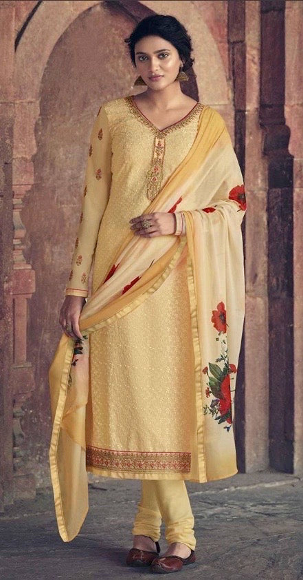 Exquisite cream Patola faux georgette embroidered Salwar Kameez with stone work by Saree Ghor Charlotte, detailed embroidery and elegant design.