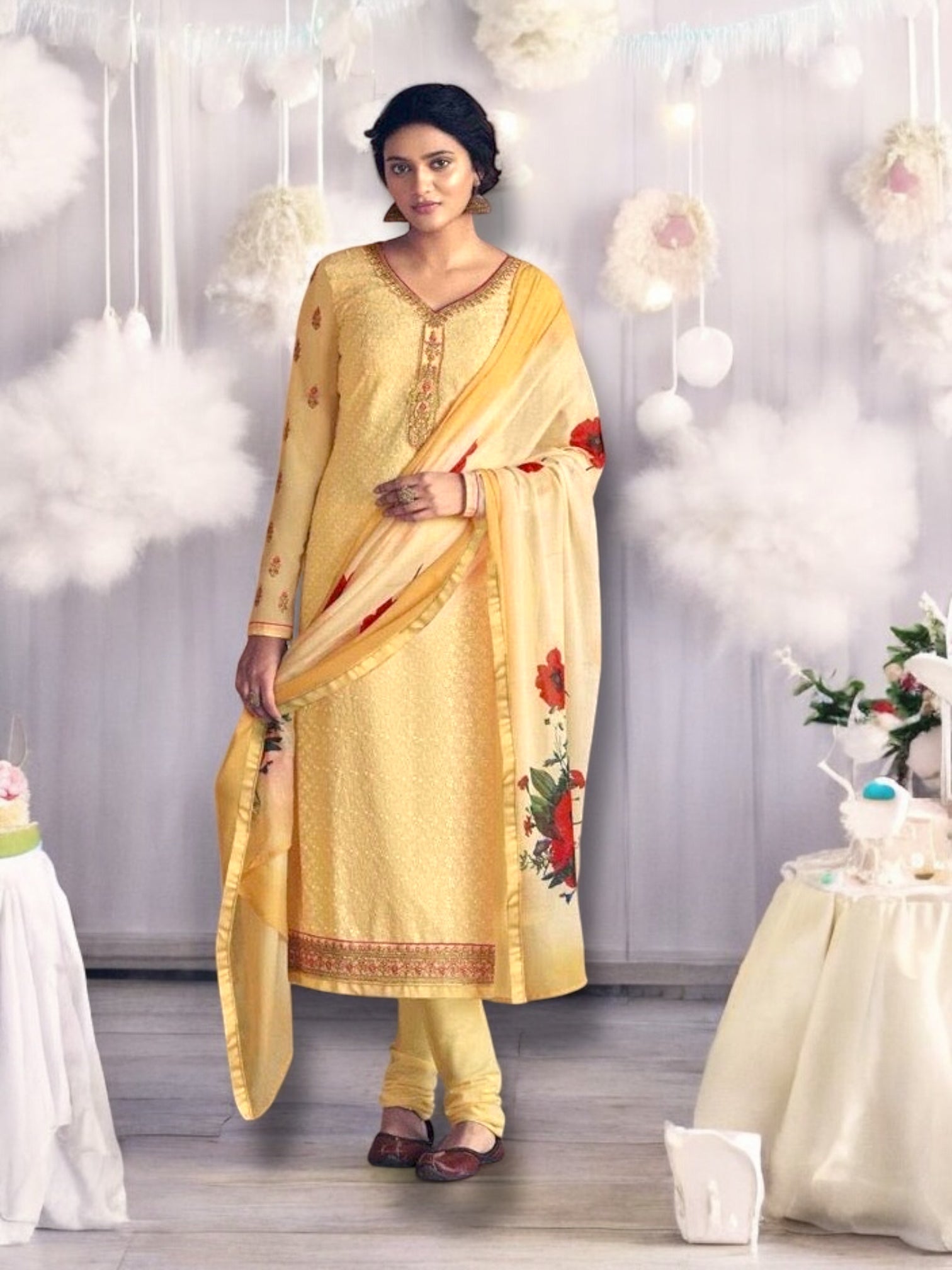 Exquisite cream Patola faux georgette embroidered salwar kameez with stone work, by Saree Ghor Charlotte, shown with intricate detailing.