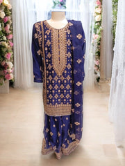 Girls traditional designer Salwar Kameez suit by Saree Ghor Charlotte, featuring colorful ethnic wear with intricate patterns.