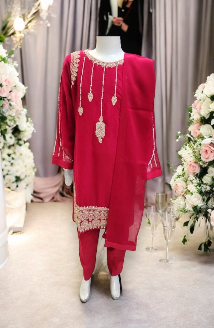 Girls traditional designer Salwar Kameez suit by Saree Ghor Charlotte, featuring vibrant ethnic wear with intricate patterns and elegant styling.