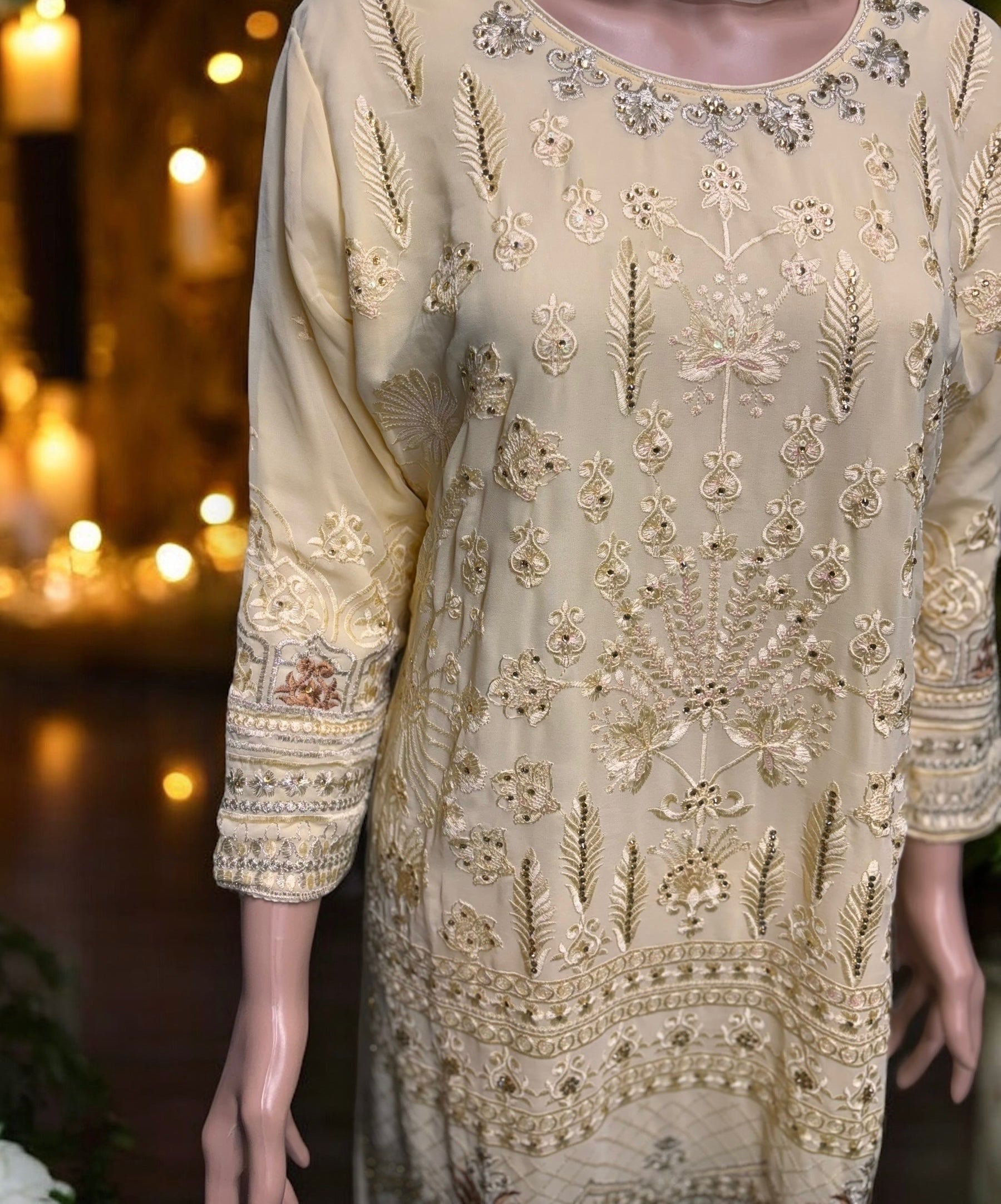 Golden color georgette salwar kameez set with intricate embroidery, traditional ethnic wear for women by Saree Ghor Charlotte.