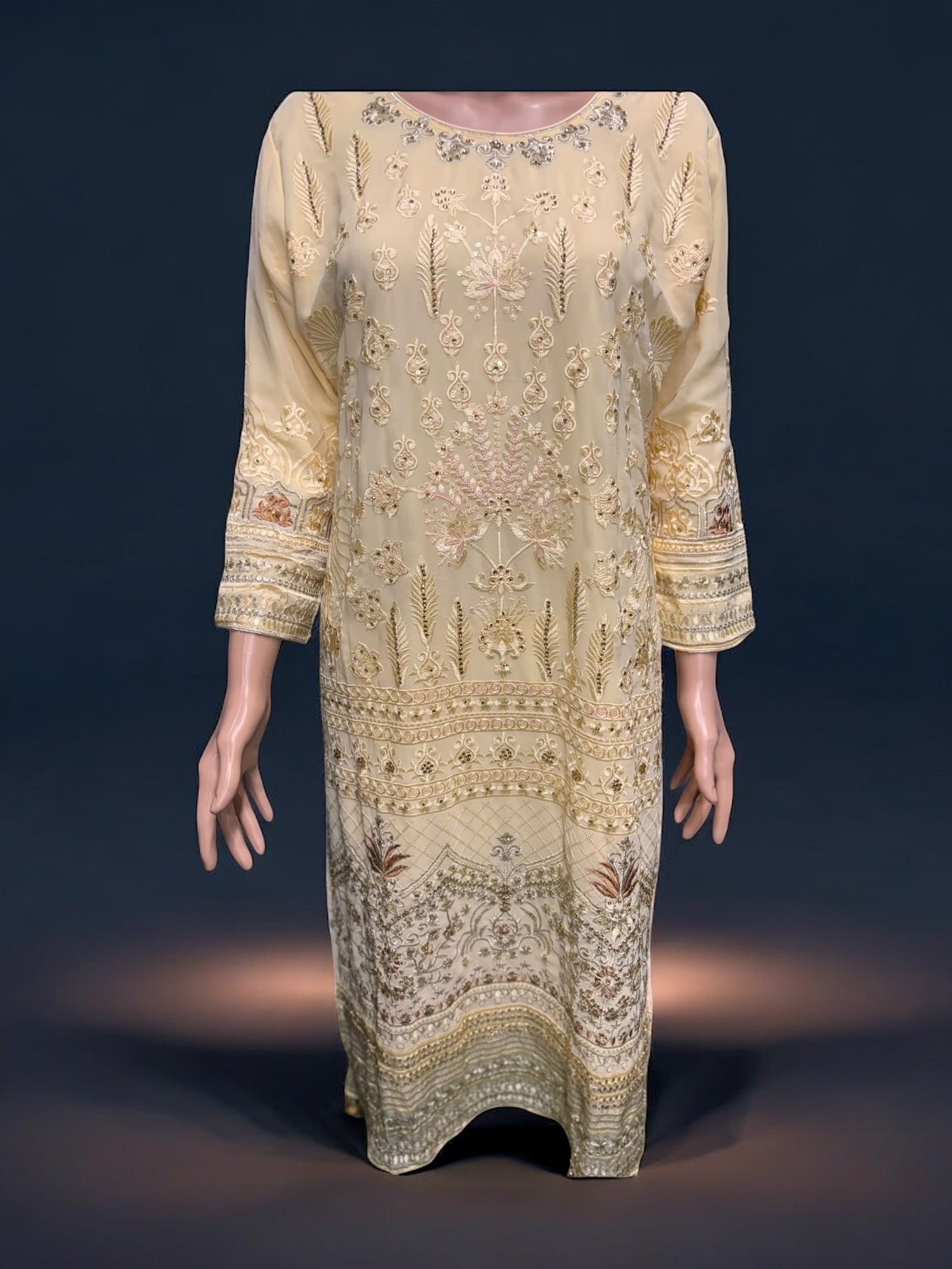 Golden color georgette salwar kameez set with intricate embroidery, traditional ethnic wear for women by Saree Ghor Charlotte.