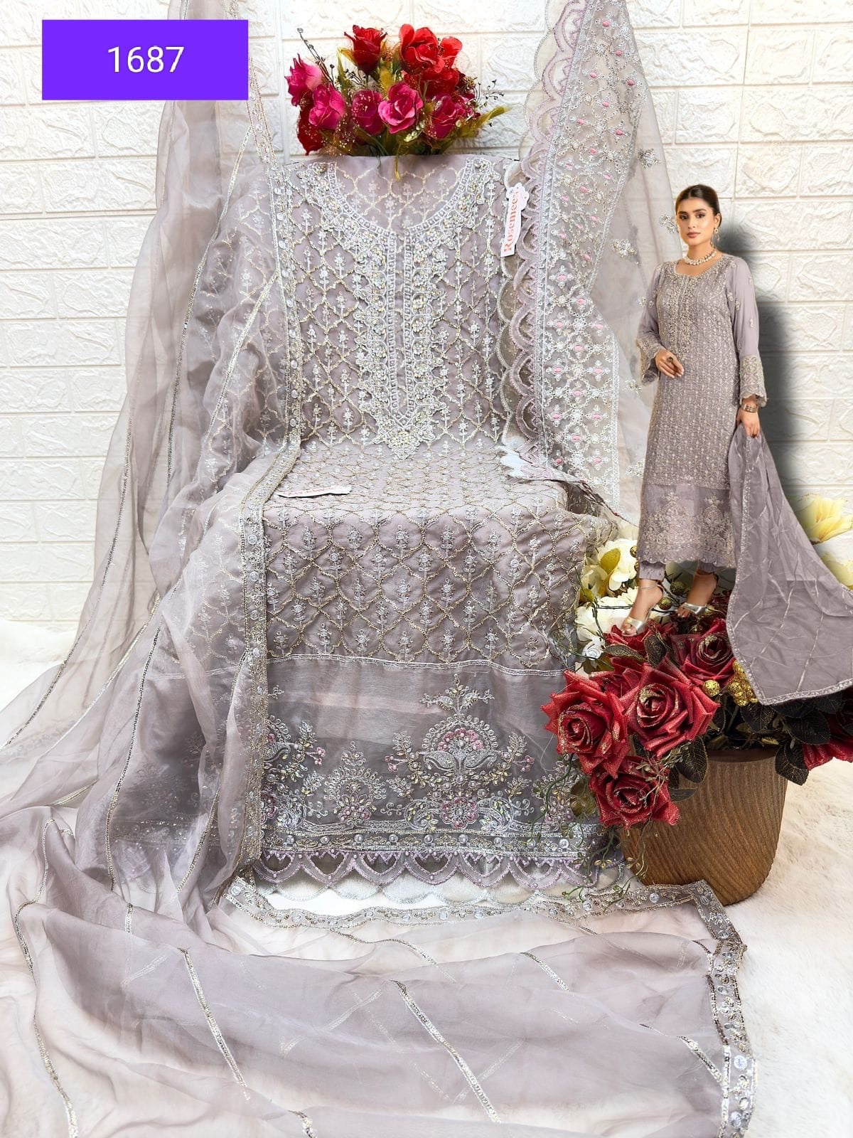 Traditional designer Salwar Kameez suit by Saree Ghor Charlotte featuring intricate embroidery and vibrant ethnic wear for women.