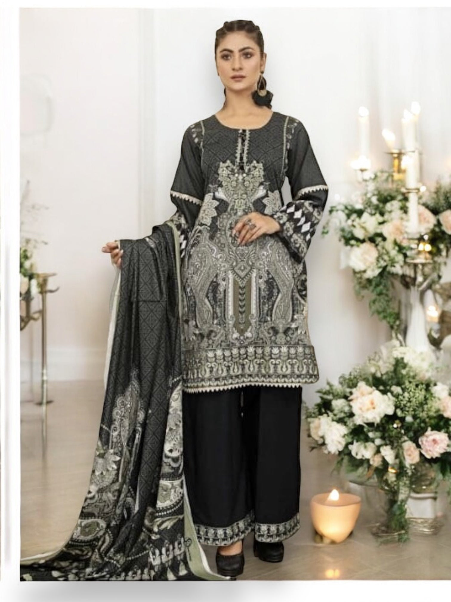 Traditional embroidered Haya designer Pakistani salwar kameez for women, featuring intricate ethnic embroidery and vibrant fabric details.