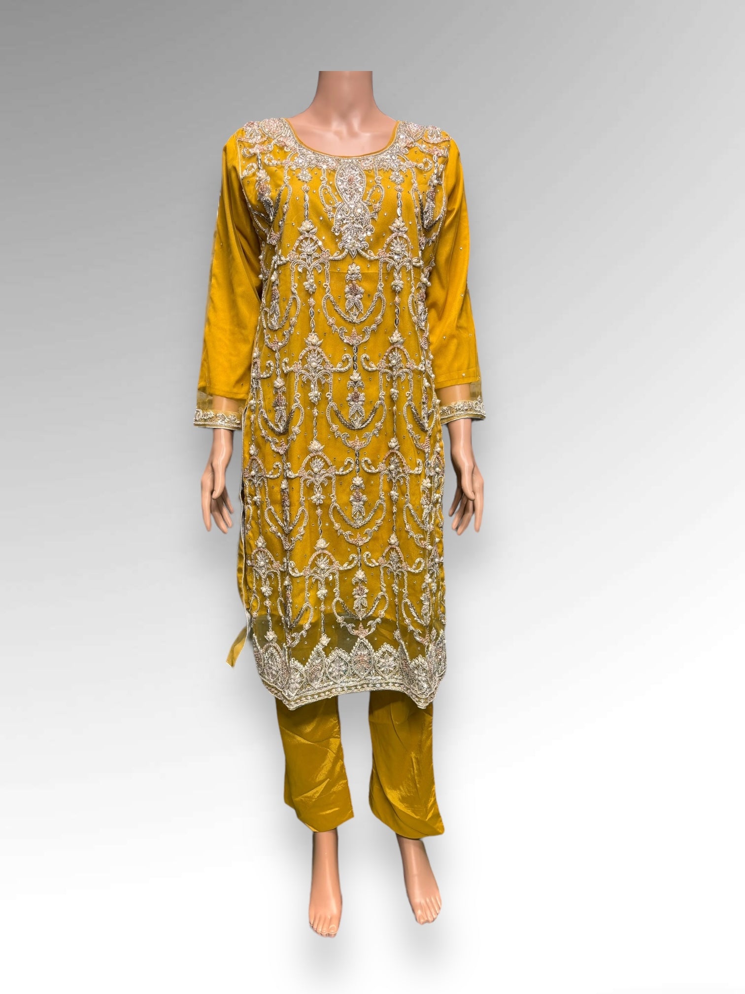 Designer Saree Ghor Charlotte Salwar Kameez ensemble with intricate handwork, traditional ethnic wear for women.