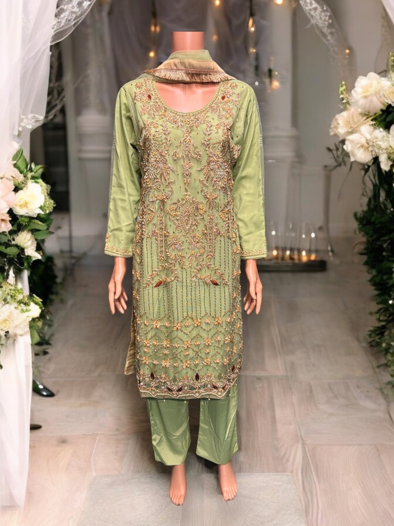 Elegant handwork designer Salwar Kameez ensemble by Saree Ghor Charlotte featuring intricate embroidery and traditional style.