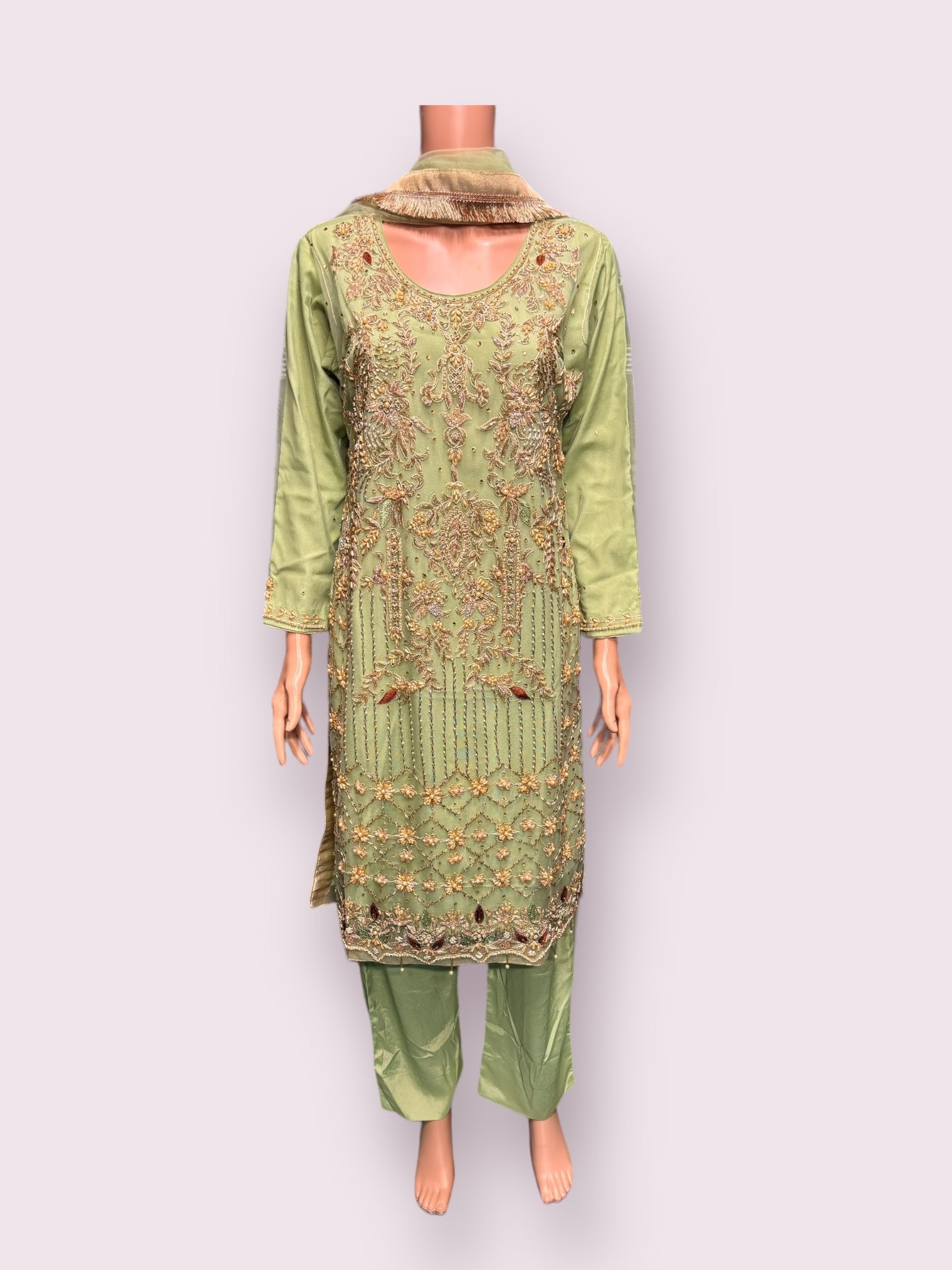 Elegant handwork designer Salwar Kameez by Saree Ghor Charlotte featuring intricate embroidery and vibrant fabric details.
