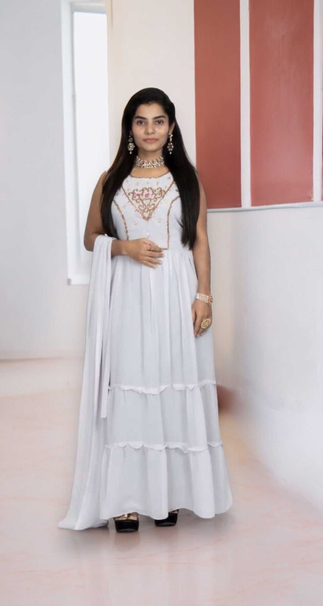 Elegant Georgette stone work long gown salwar kameez by Saree Ghor Charlotte, featuring intricate embroidery and flowing fabric.