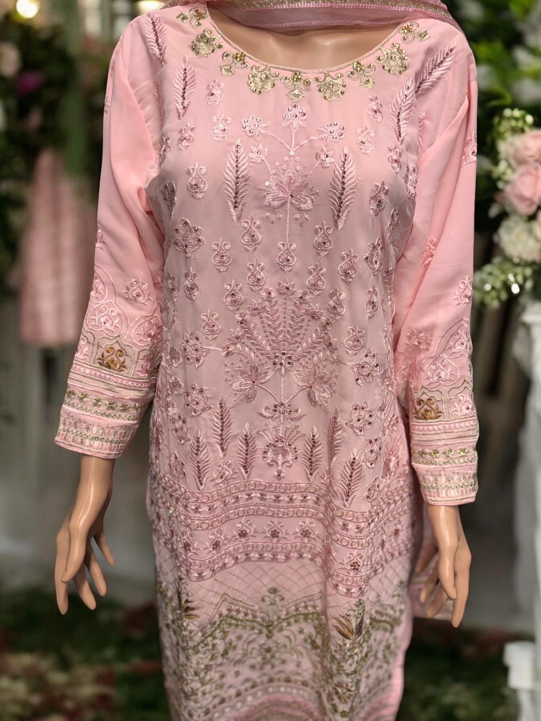 Pink Georgette Salwar Kameez with embroidery work by Saree Ghor Charlotte, featuring traditional ethnic wear for women.