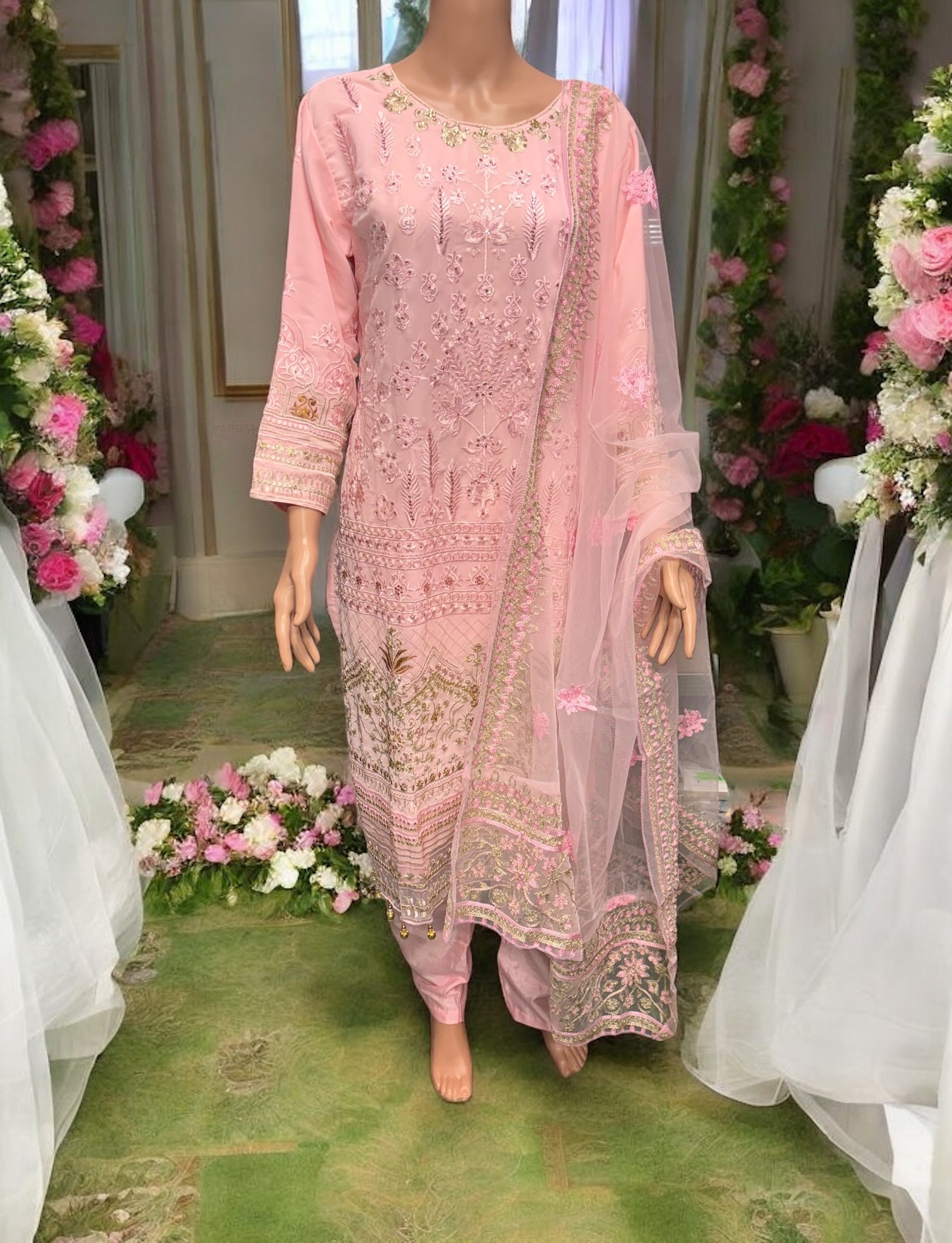 Pink Georgette Salwar Kameez with embroidery from Saree Ghor Charlotte, traditional Indian ethnic wear for women.