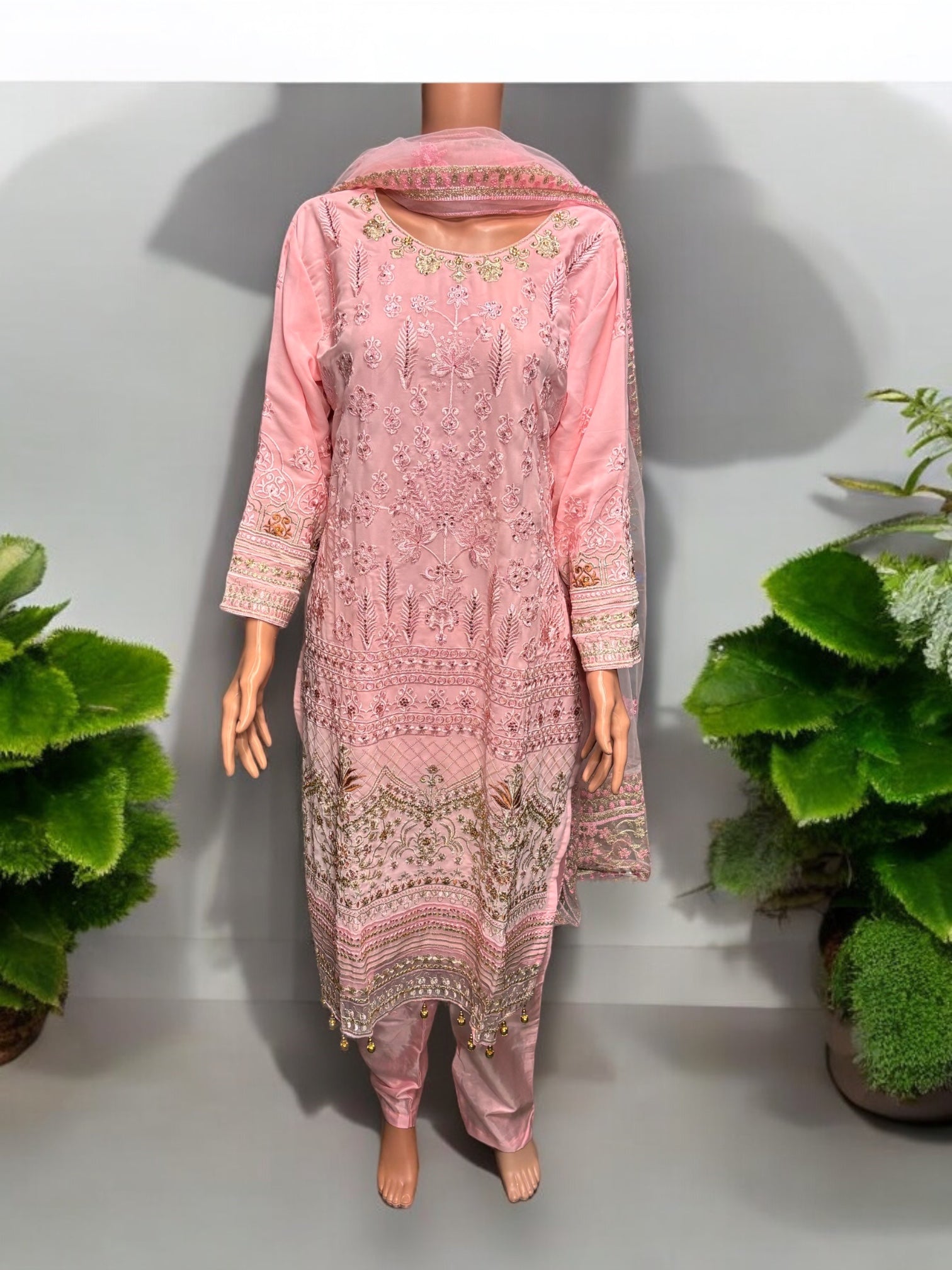 Pink Georgette Salwar Kameez with embroidery work from Saree Ghor Charlotte, showcasing traditional ethnic wear for women.