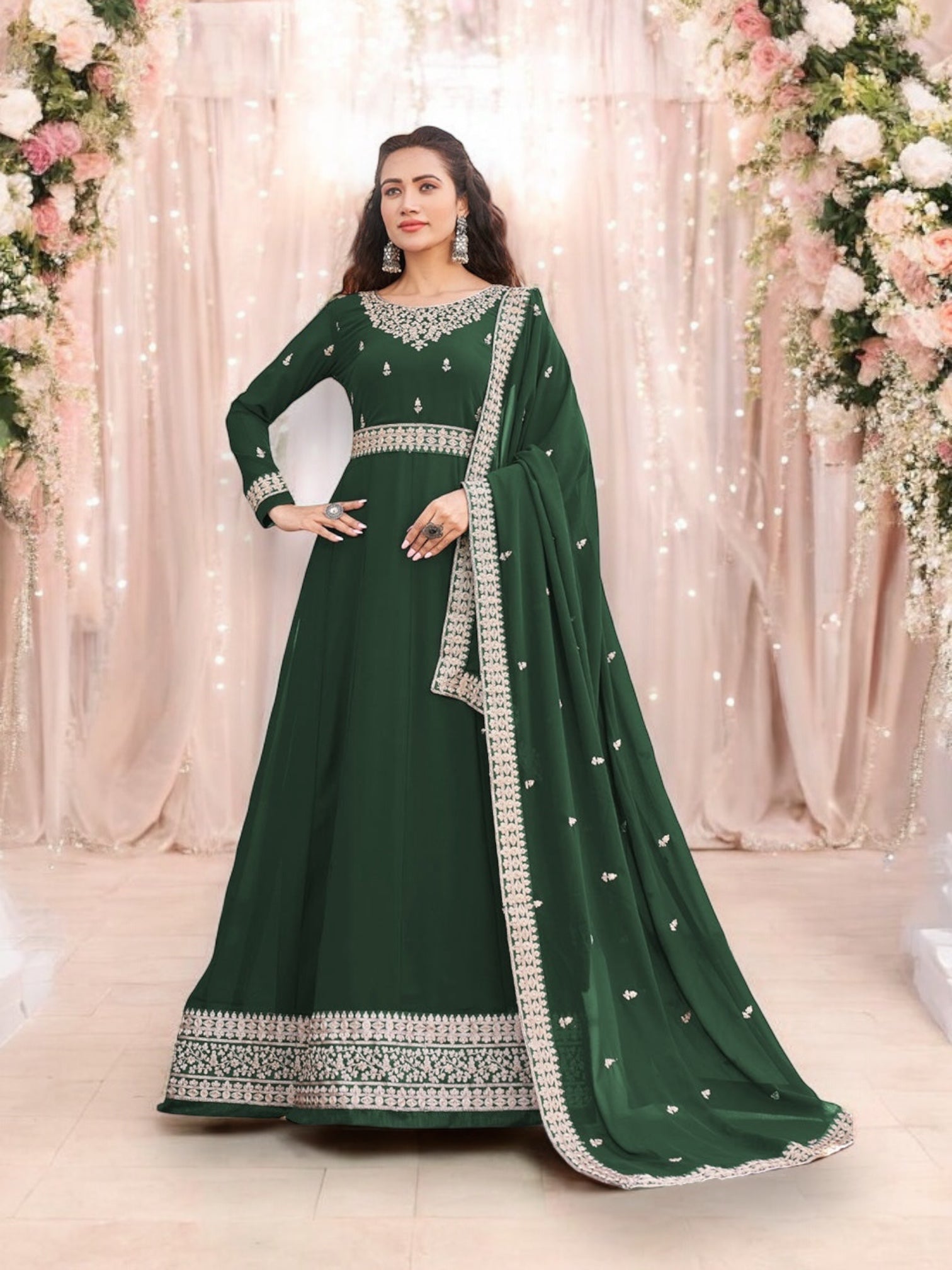 Traditional green faux georgette salwar kameez with heavy embroidery for women, cultural wear by Saree Ghor Charlotte.