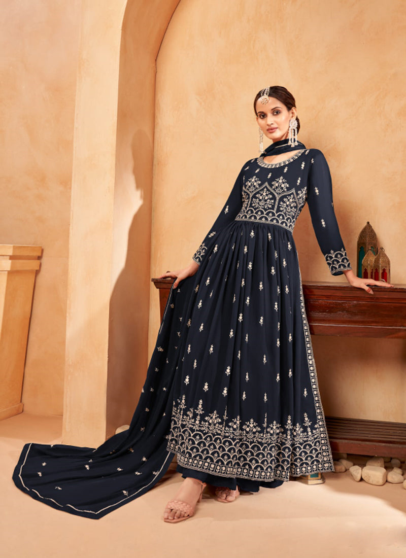 Traditional navy blue Nayra cut faux georgette salwar suit by Saree Ghor Charlotte, featuring intricate embroidery and elegant ethnic design.
