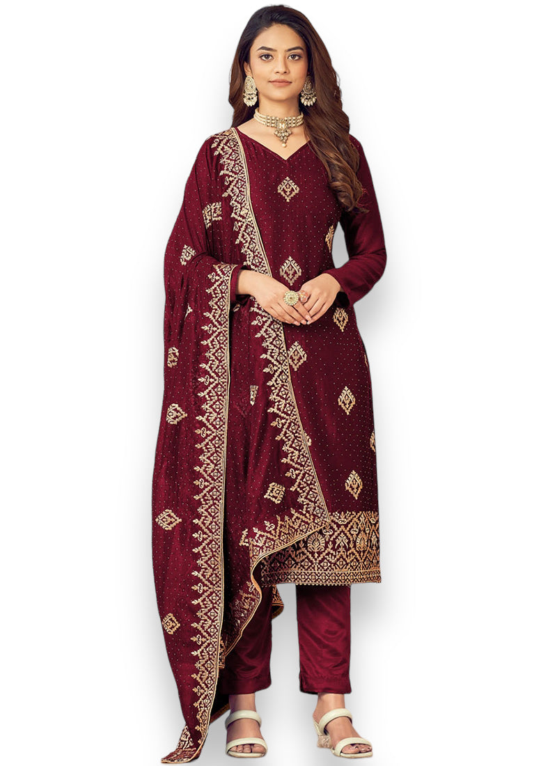 Traditional Regal Maroon Bridal Salwar Kameez by Saree Ghor Charlotte, featuring intricate embroidery for wedding or cultural wear.