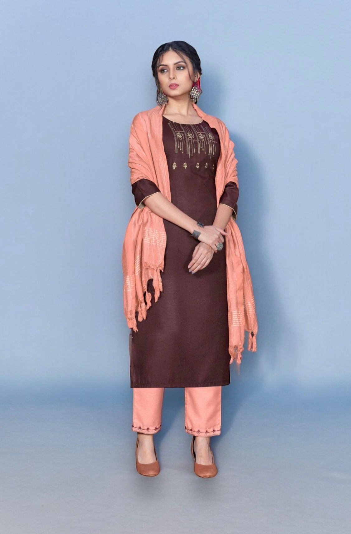 Traditional Saree Ghor Charlotte Salwar Kameez suit for women, showcasing ethnic wear with detailed embroidery and vibrant colors.