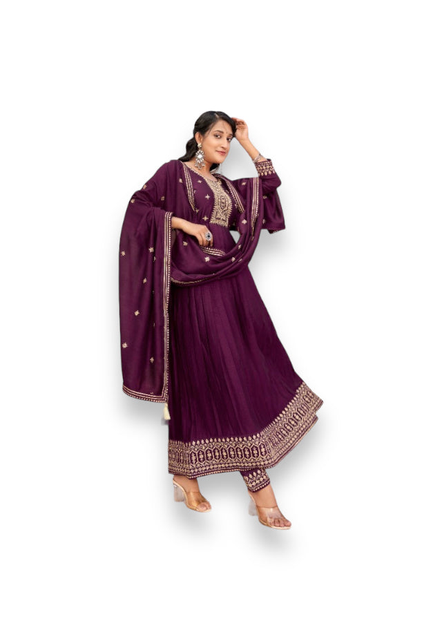 Traditional Vichitra Silk Salwar Suit with fancy work, designed for women, featuring intricate ethnic embroidery and vibrant colors.