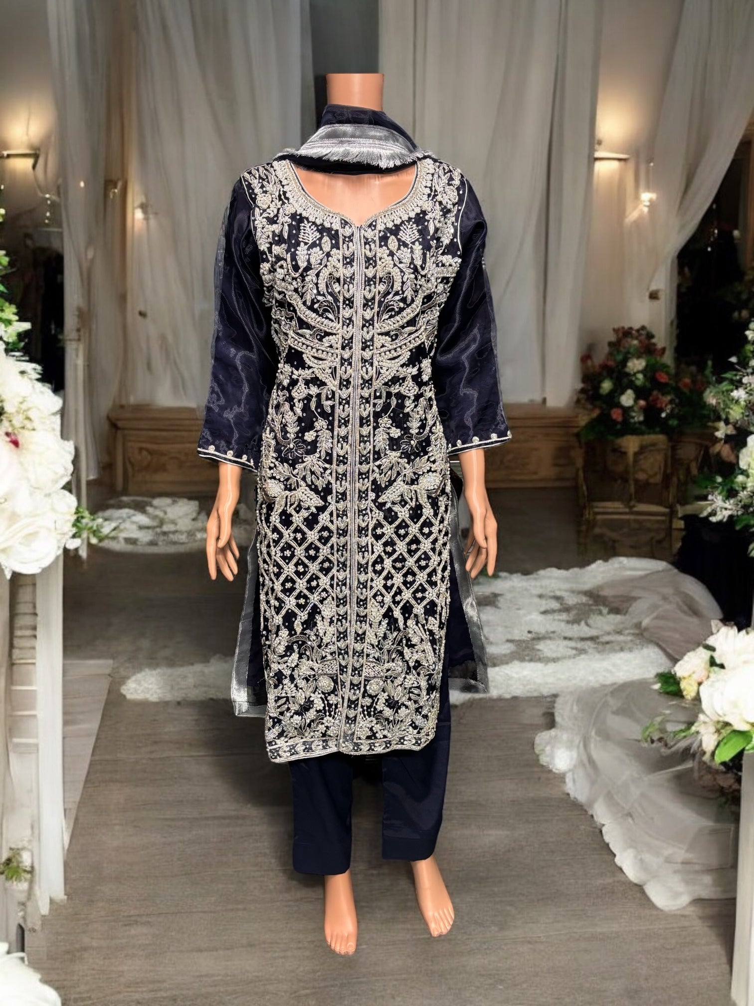 Designer Saree Ghor Charlotte Salwar Kameez ensemble for women featuring intricate handwork and traditional ethnic wear style.