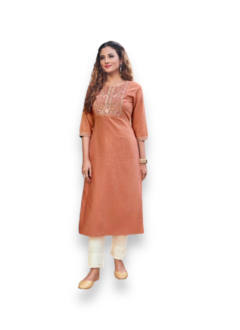 Kivi Liza designer rayon kurti with intricate embroidery, paired with salwar kameez from Saree Ghor Charlotte.
