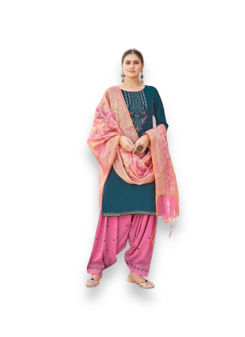 Luxe Silk Salwar Suit by Saree Ghor Charlotte, Kalaroop Sunheri Vol 5, featuring elegant silk fabric and traditional styling.