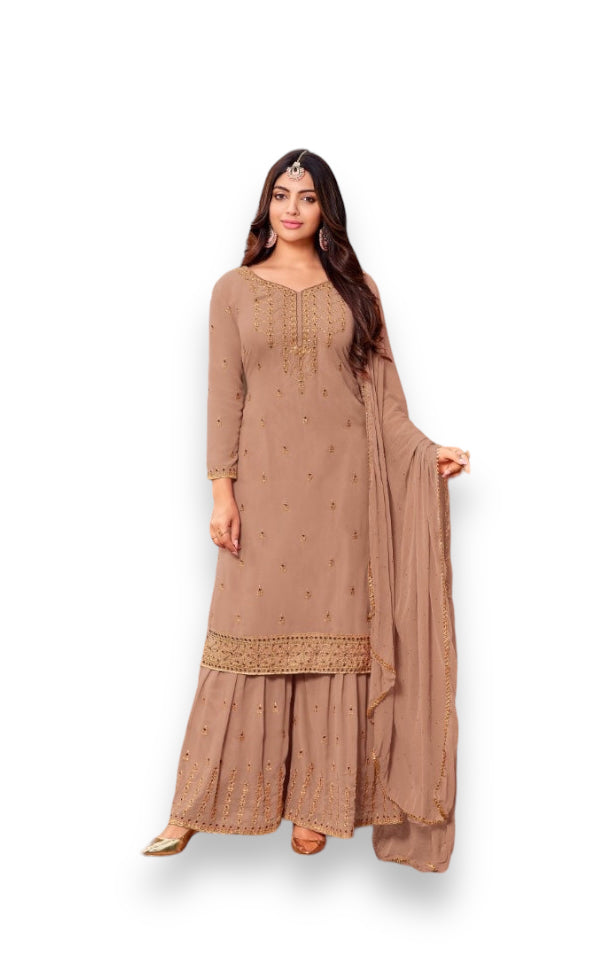 Traditional designer Salwar Kameez by Saree Ghor Charlotte, featuring intricate embroidery and vibrant ethnic wear for women.