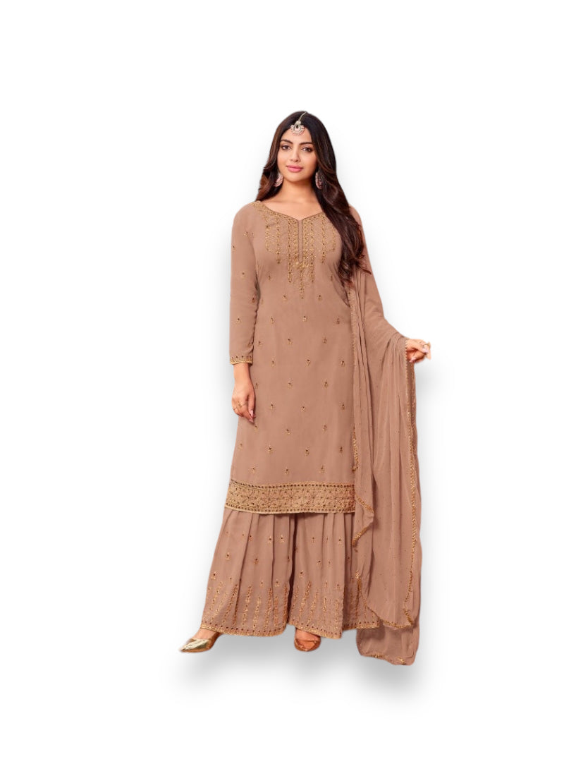 Traditional designer Salwar Kameez by Saree Ghor Charlotte, featuring intricate embroidery and vibrant ethnic wear for women.