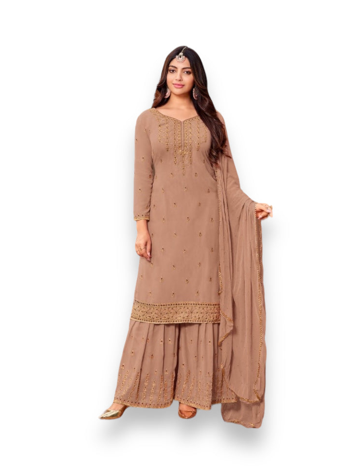 Traditional designer Salwar Kameez for women by Saree Ghor Charlotte, featuring intricate embroidery and vibrant ethnic wear.