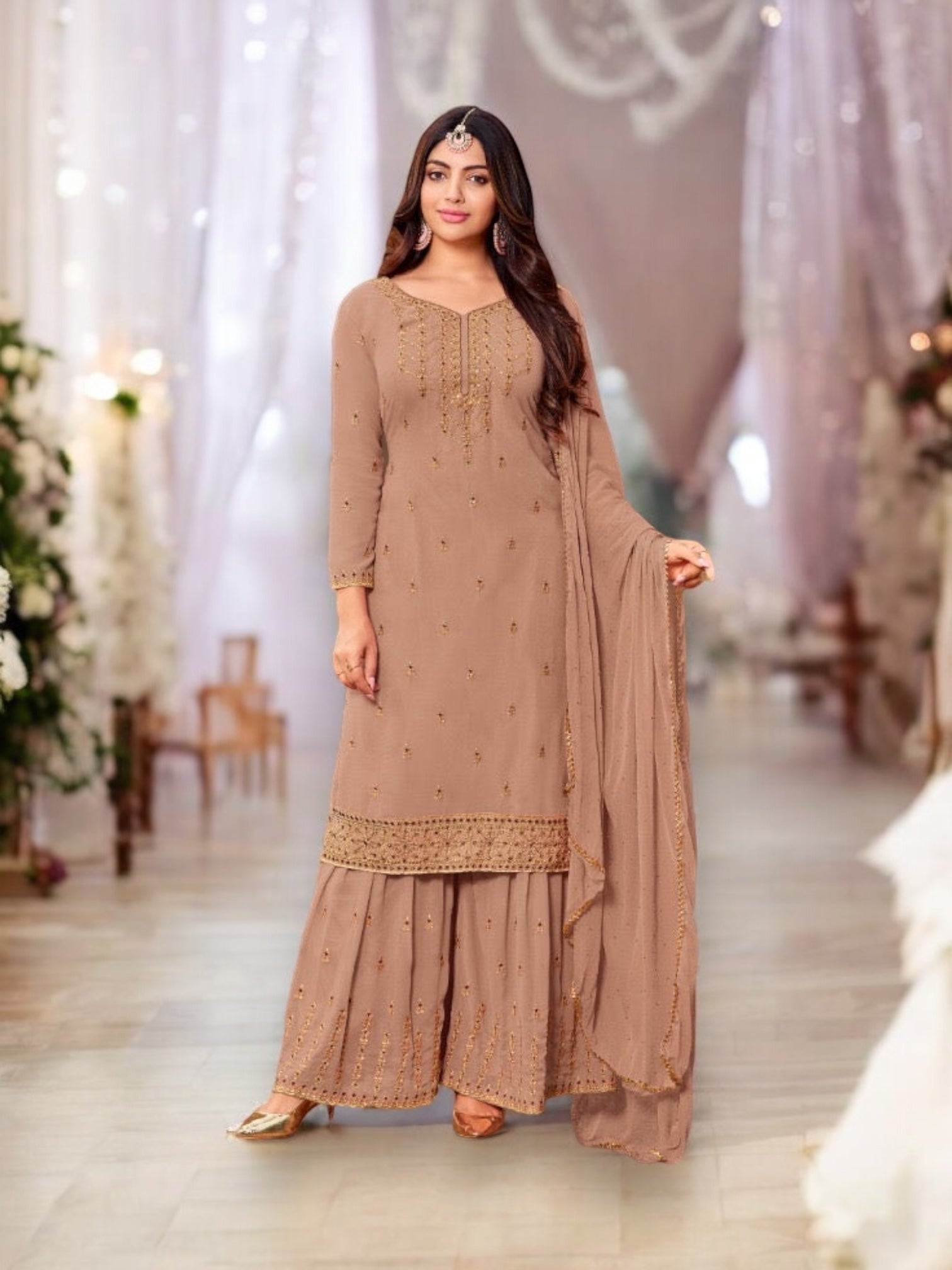 Traditional designer Salwar Kameez by Saree Ghor Charlotte, showcasing intricate ethnic embroidery and vibrant fabric for women.